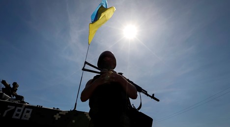 Отвод тяжелого оружия на Донбассе должно начаться во вторник